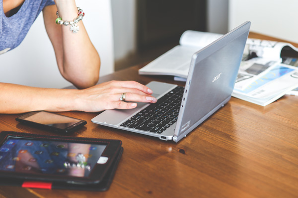 Woman with bracelet searching for an adult website